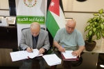 بلدية إربد الكبرى توقع اتفاقية تعبيد شارع الملك حسين “شارع حوارة”