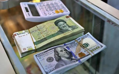 هبوط قياسي للريال الإيراني مقابل الدولار الأمريكي